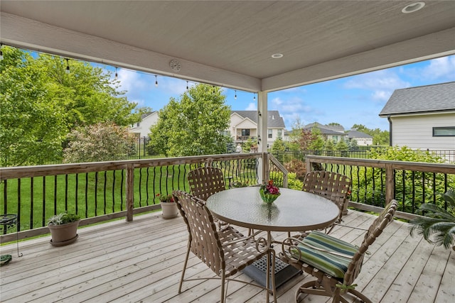 800 NE Badger Ln, Waukee, IA 50263 - deck featuring a residential view and outdoor dining area