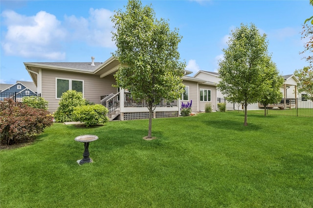 800 NE Badger Ln, Waukee, IA 50263 - rear view of property featuring a wooden deck