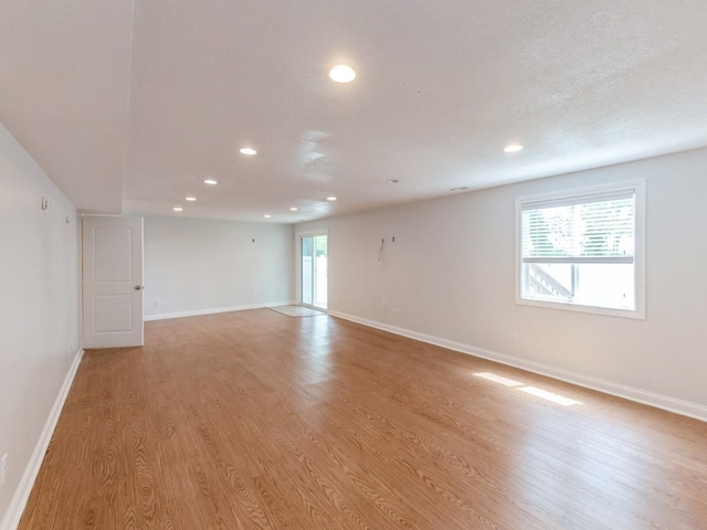 2227 4th Ave SE, Altoona, IA 50009 - empty room featuring recessed lighting and light wood finished floors