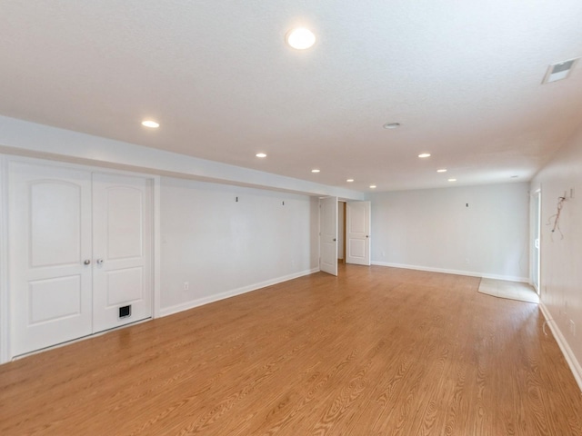 2227 4th Ave SE, Altoona, IA 50009 - spare room with recessed lighting and light wood finished floors