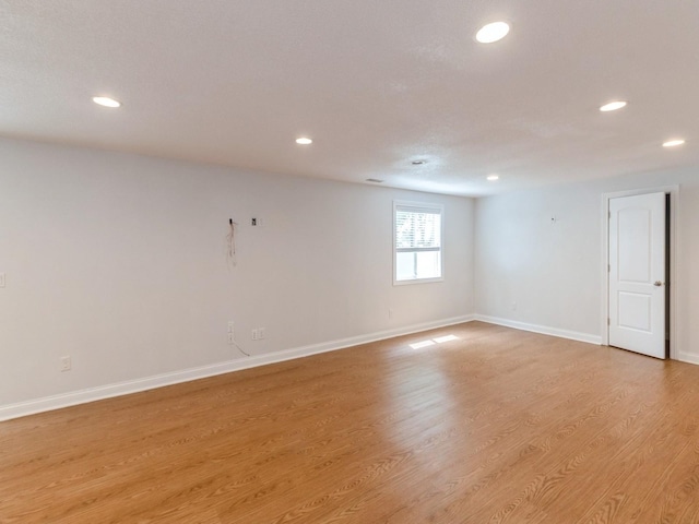 2227 4th Ave SE, Altoona, IA 50009 - unfurnished room with recessed lighting and light wood finished floors