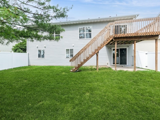 2227 4th Ave SE, Altoona, IA 50009 - back of house with stairway and a wooden deck