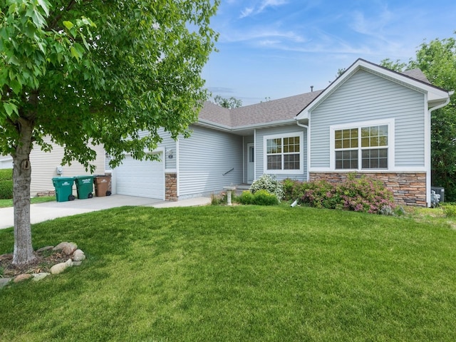 2227 4th Ave SE, Altoona, IA 50009 - single story home with concrete driveway, a front lawn, stone siding, a garage, and a shingled roof