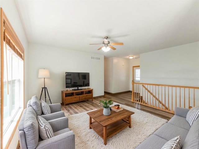 2227 4th Ave SE, Altoona, IA 50009 - living area with a ceiling fan and wood finished floors