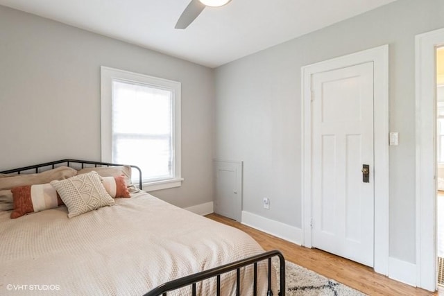 2417 Maryland Pike, Des Moines, IA 50310 - bedroom with light wood-style flooring and ceiling fan