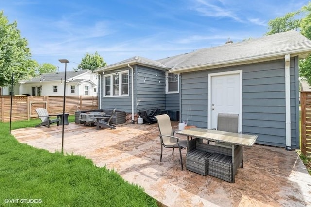 2417 Maryland Pike, Des Moines, IA 50310 - rear view of house featuring a patio area and outdoor dining area