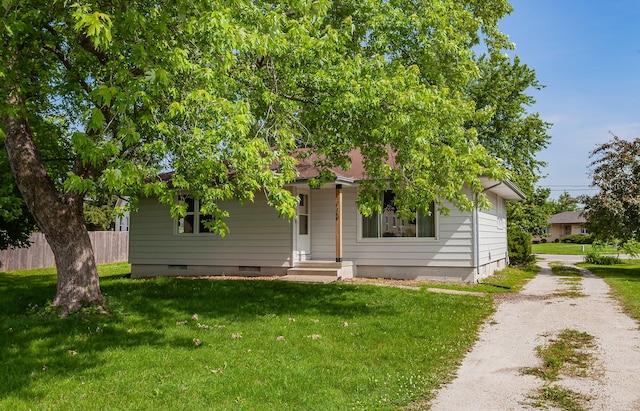 715 Maple St, Waukee, IA 50263 - view of property hidden behind natural elements with dirt driveway and crawl space