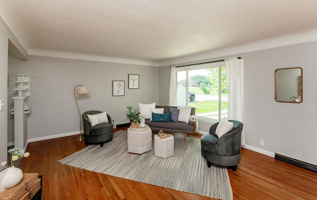 715 Maple St, Waukee, IA 50263 - living room with wood finished floors and baseboards