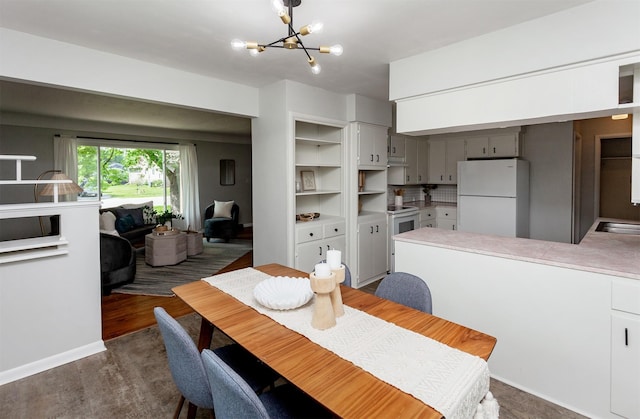 715 Maple St, Waukee, IA 50263 - dining area with a chandelier