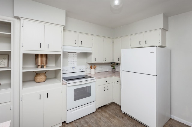 715 Maple St, Waukee, IA 50263 - kitchen featuring white appliances, under cabinet range hood, light wood finished floors, light countertops, and white cabinetry