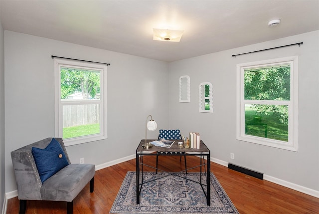 715 Maple St, Waukee, IA 50263 - home office with wood finished floors and baseboards