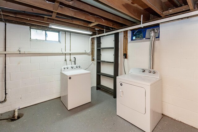 715 Maple St, Waukee, IA 50263 - below grade area featuring washer and clothes dryer