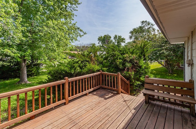 715 Maple St, Waukee, IA 50263 - wooden terrace featuring view of wooded area