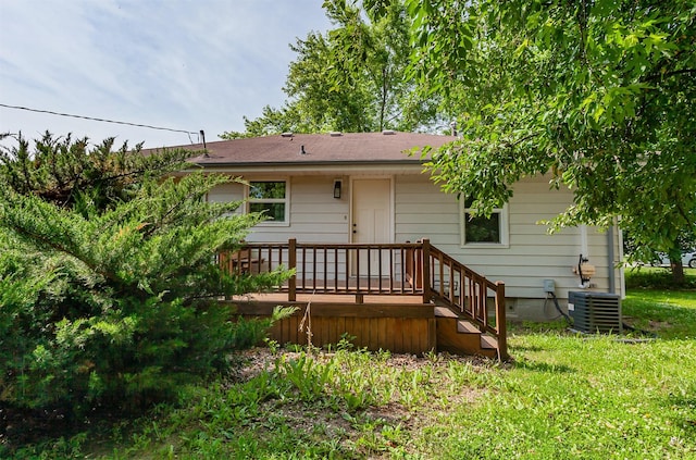 715 Maple St, Waukee, IA 50263 - rear view of house with a wooden deck and a shingled roof