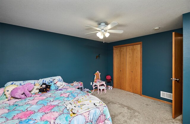 2014 Vista View Dr, Granger, IA 50109 - bedroom with carpet, a closet, and ceiling fan