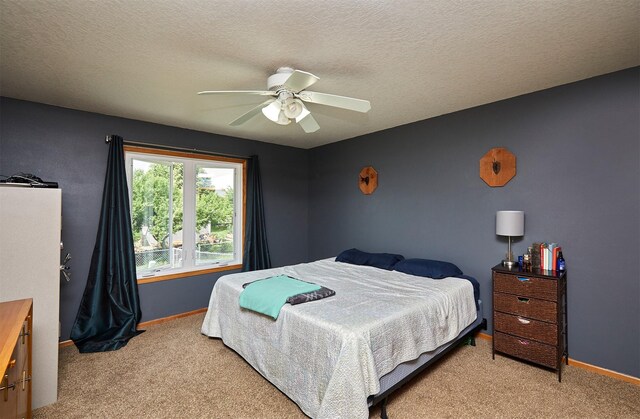 2014 Vista View Dr, Granger, IA 50109 - bedroom featuring light colored carpet, a ceiling fan, and a textured ceiling
