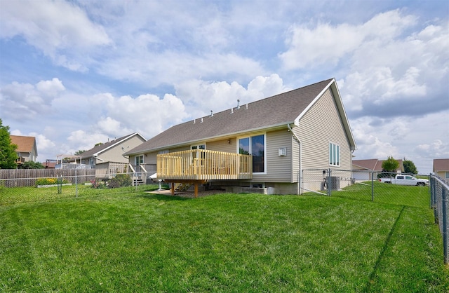 2014 Vista View Dr, Granger, IA 50109 - rear view of property featuring a fenced backyard, a wooden deck, and roof with shingles