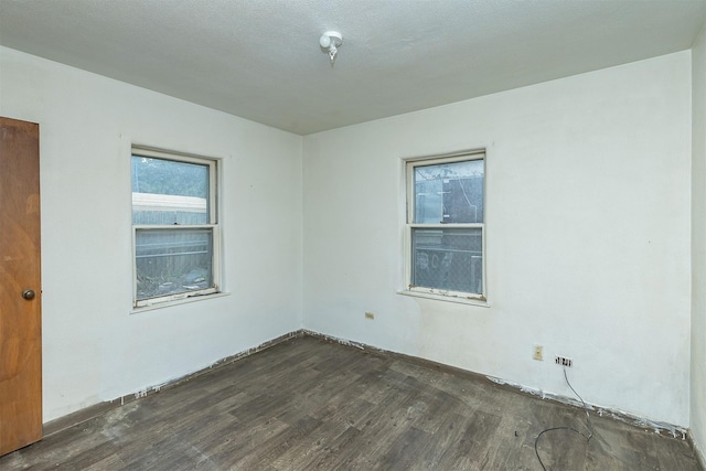 3120 Amherst St, Des Moines, IA 50313 - spare room with dark wood-style flooring