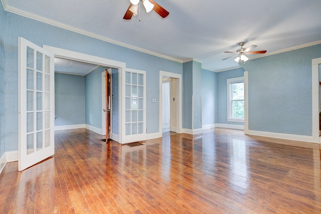 2736 College Ave, Des Moines, IA 50311 - spare room with french doors, ceiling fan, ornamental molding, and wood finished floors