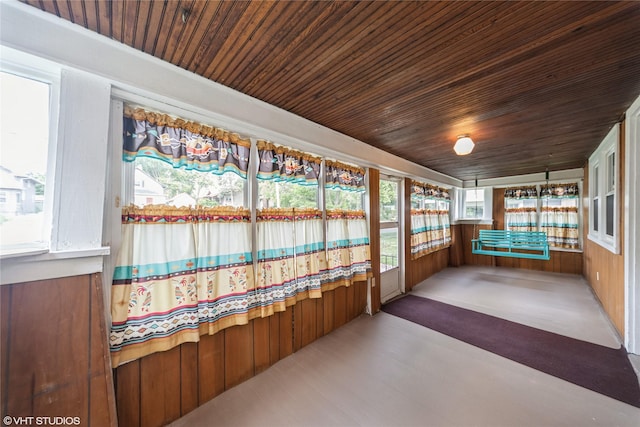 737 38th St, Des Moines, IA 50312 - unfurnished sunroom with wooden ceiling and wooden walls