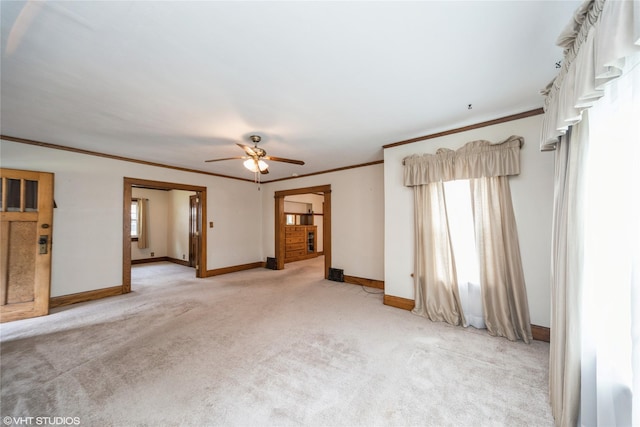 737 38th St, Des Moines, IA 50312 - spare room with ceiling fan, light carpet, and crown molding