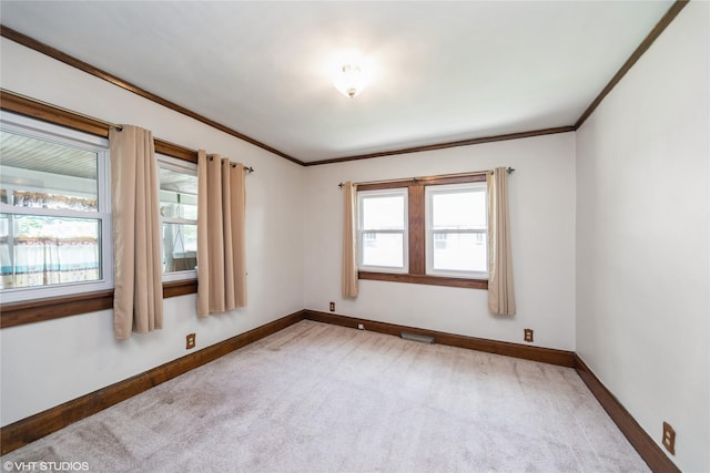 737 38th St, Des Moines, IA 50312 - unfurnished room featuring carpet floors and ornamental molding