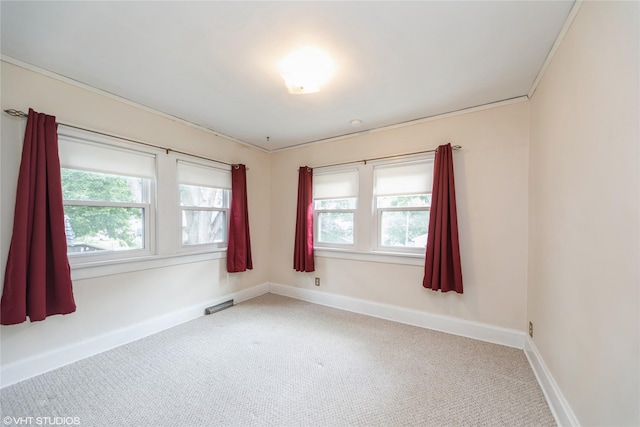 737 38th St, Des Moines, IA 50312 - unfurnished room featuring carpet flooring and baseboards