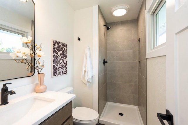 8501 NW Beaver Dr, Johnston, IA 50131 - full bath featuring vanity and a tile shower