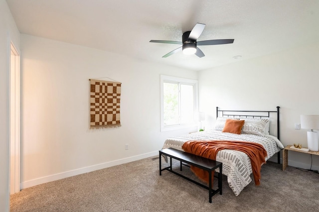 8501 NW Beaver Dr, Johnston, IA 50131 - bedroom with carpet and ceiling fan