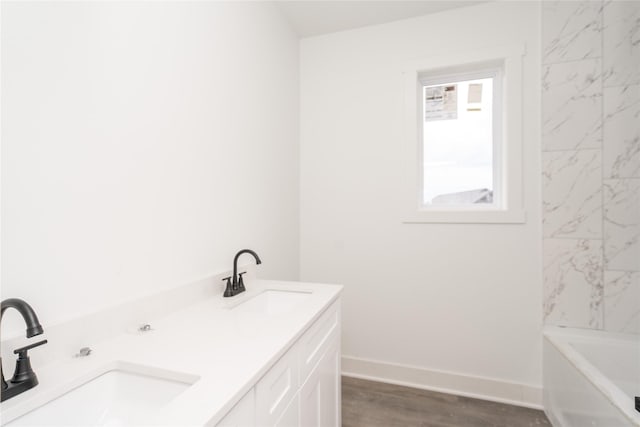 17987 Alpine Dr, Clive, IA 50325 - full bath with a tub to relax in, double vanity, wood finished floors, and a shower
