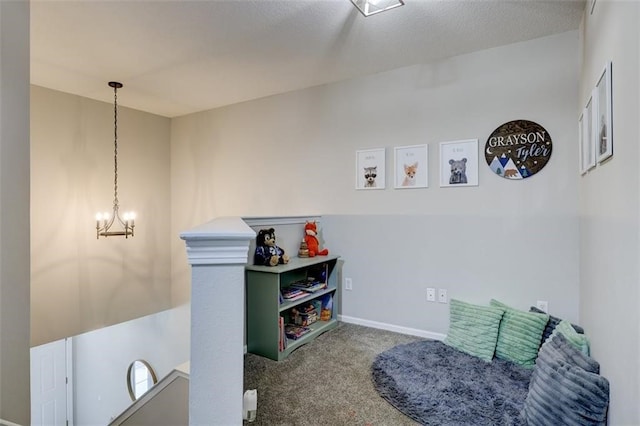 5583 Meredith Dr Unit 5C, Des Moines, IA 50310 - sitting room featuring carpet flooring and a chandelier