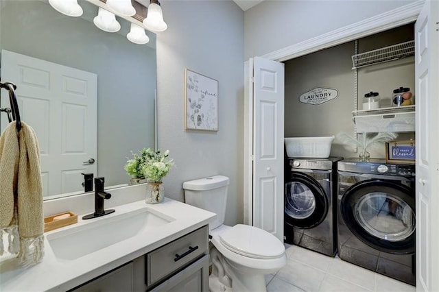 5583 Meredith Dr Unit 5C, Des Moines, IA 50310 - bathroom with washer and clothes dryer, vanity, and tile patterned flooring