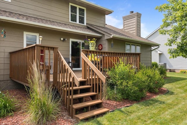 1305 NW Wagner Blvd, Ankeny, IA 50023 - rear view of property with stairs, a deck, a shingled roof, and a chimney