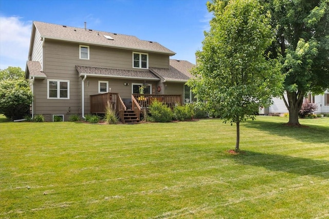 1305 NW Wagner Blvd, Ankeny, IA 50023 - rear view of house featuring a wooden deck, a lawn, and roof with shingles