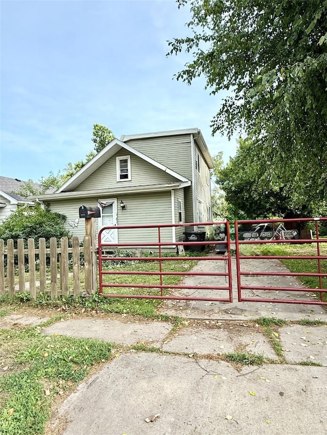 2216 Logan Ave, Des Moines, IA 50317 - view of front of house with a gate