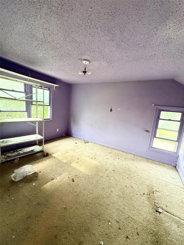 2216 Logan Ave, Des Moines, IA 50317 - unfurnished bedroom with a textured ceiling