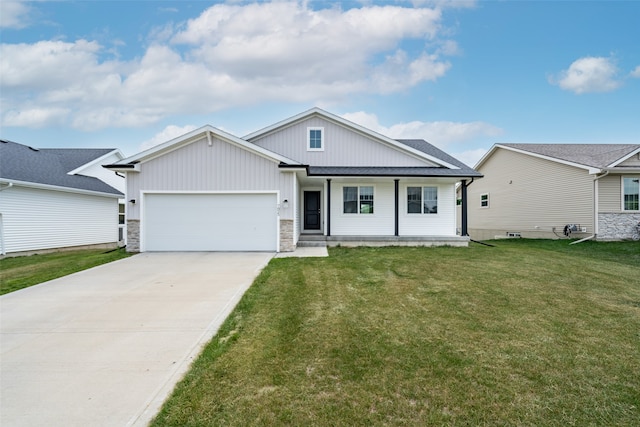 7825 SE 2nd St, Des Moines, IA 50320 - modern farmhouse style home with a garage, concrete driveway, a front lawn, board and batten siding, and covered porch