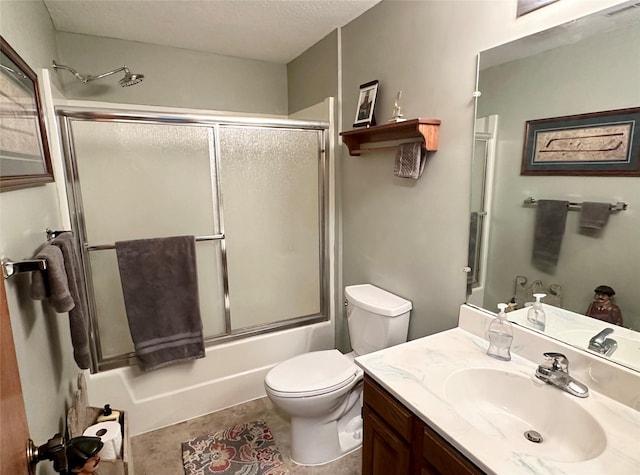 2005 Spring St Unit U203, Grinnell, IA 50112 - bathroom featuring vanity, enclosed tub / shower combo, and a textured ceiling