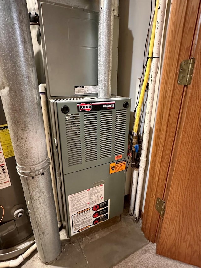 2005 Spring St Unit U203, Grinnell, IA 50112 - utility room featuring heating unit