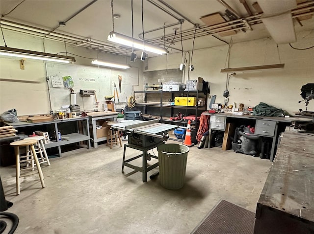 2005 Spring St Unit U203, Grinnell, IA 50112 - garage featuring a workshop area