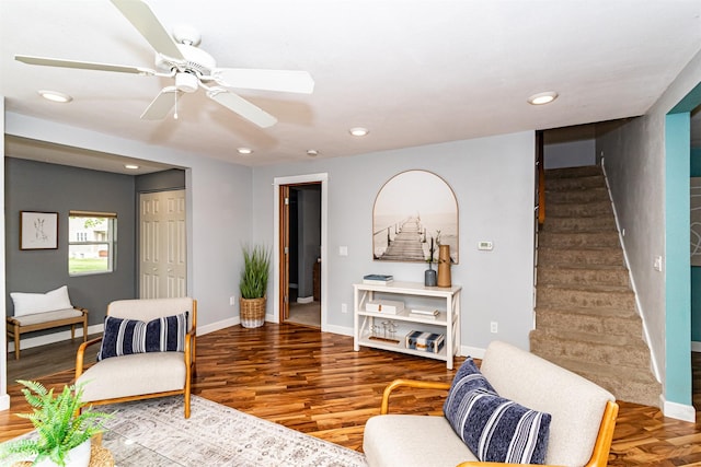 1229 9th St, Nevada, IA 50201 - living area featuring stairs, wood finished floors, recessed lighting, and ceiling fan