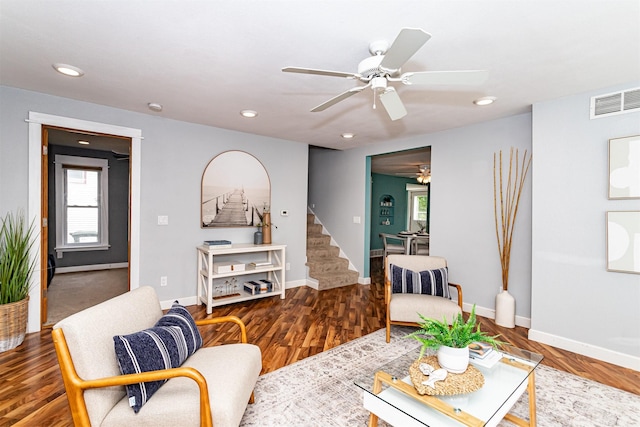 1229 9th St, Nevada, IA 50201 - living room featuring a ceiling fan, stairway, recessed lighting, and wood finished floors