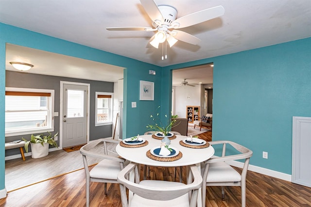 1229 9th St, Nevada, IA 50201 - dining area featuring a ceiling fan and wood finished floors