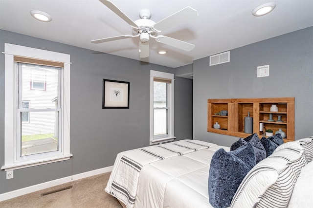 1229 9th St, Nevada, IA 50201 - bedroom featuring light carpet, recessed lighting, and ceiling fan
