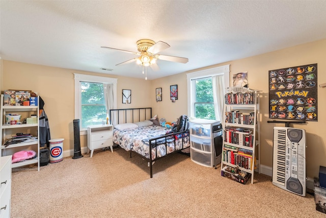 2800 E Douglas Ave, Des Moines, IA 50317 - bedroom with carpet and a ceiling fan