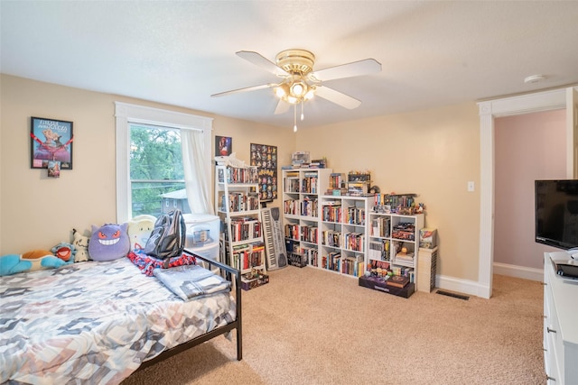 2800 E Douglas Ave, Des Moines, IA 50317 - bedroom with carpet and ceiling fan