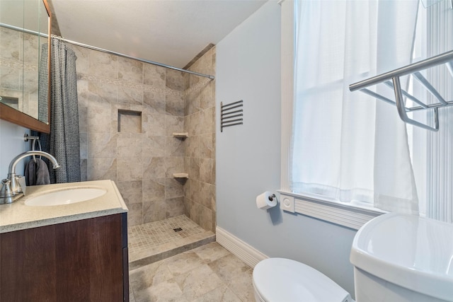 2800 E Douglas Ave, Des Moines, IA 50317 - bathroom featuring tiled shower and vanity