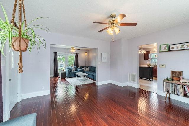 2800 E Douglas Ave, Des Moines, IA 50317 - unfurnished living room with ceiling fan and wood finished floors