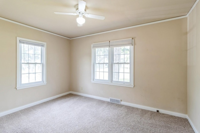 6420 Center St, Des Moines, IA 50312 - carpeted empty room with ornamental molding and ceiling fan