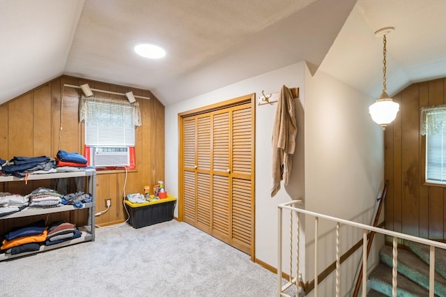 6420 Center St, Des Moines, IA 50312 - bonus room with vaulted ceiling, wood walls, carpet floors, and cooling unit